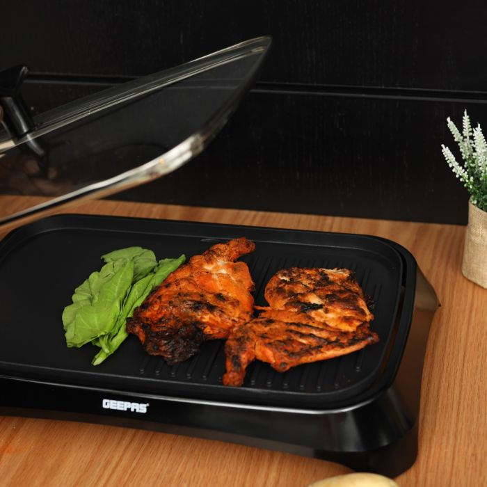 Geepas 1600W Electric Barbeque Grill - Adjustable Thermostat Non-Stick Smokeless Grill Indoor With Glass Lid | Overheat Protection & On Indicator Light | Ideal For Bacon, Beef, Chicken, Veggies & More